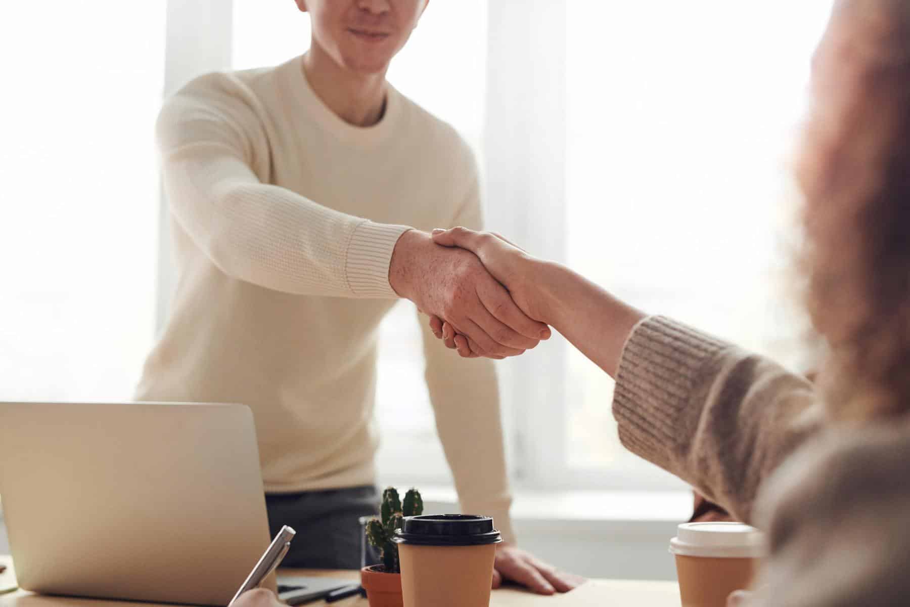 Man and woman doing handshake