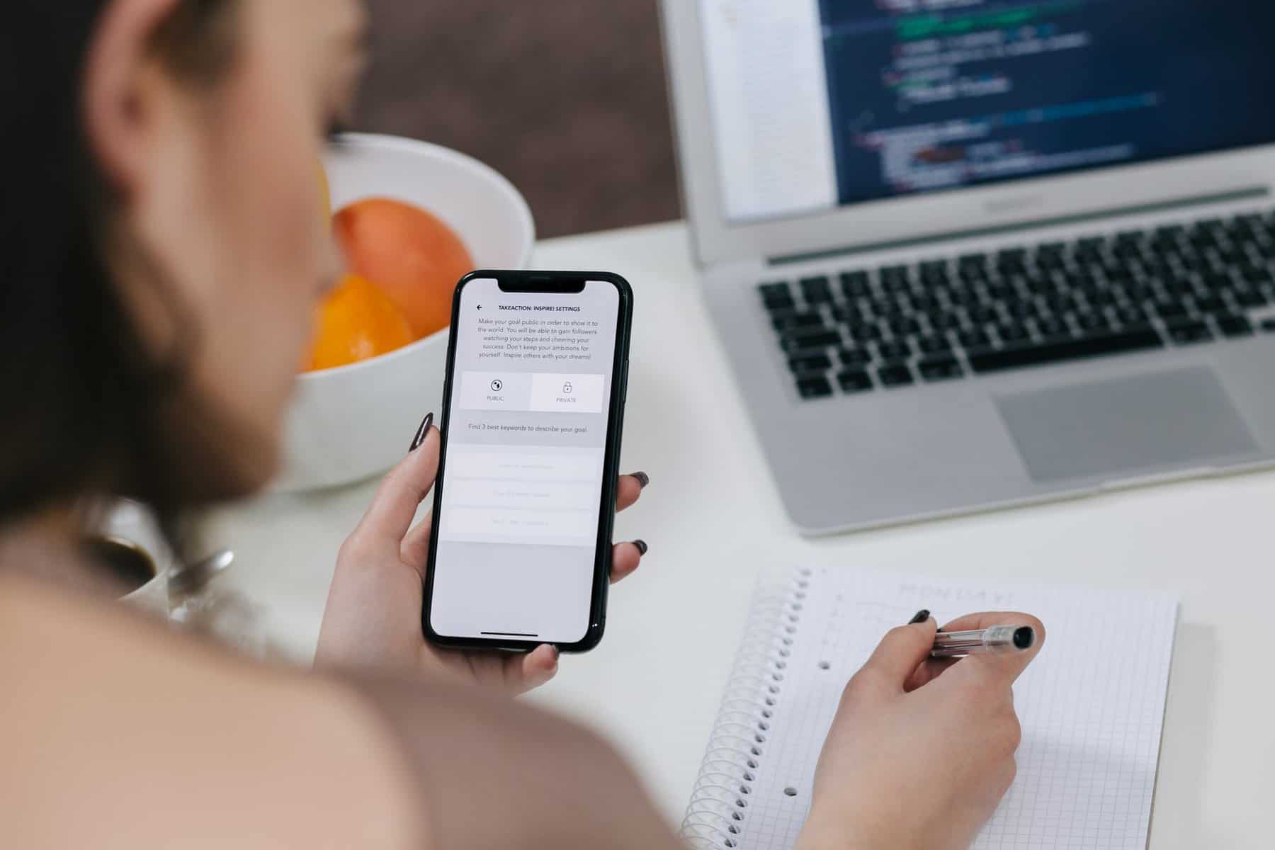 Woman inspecting mobile design